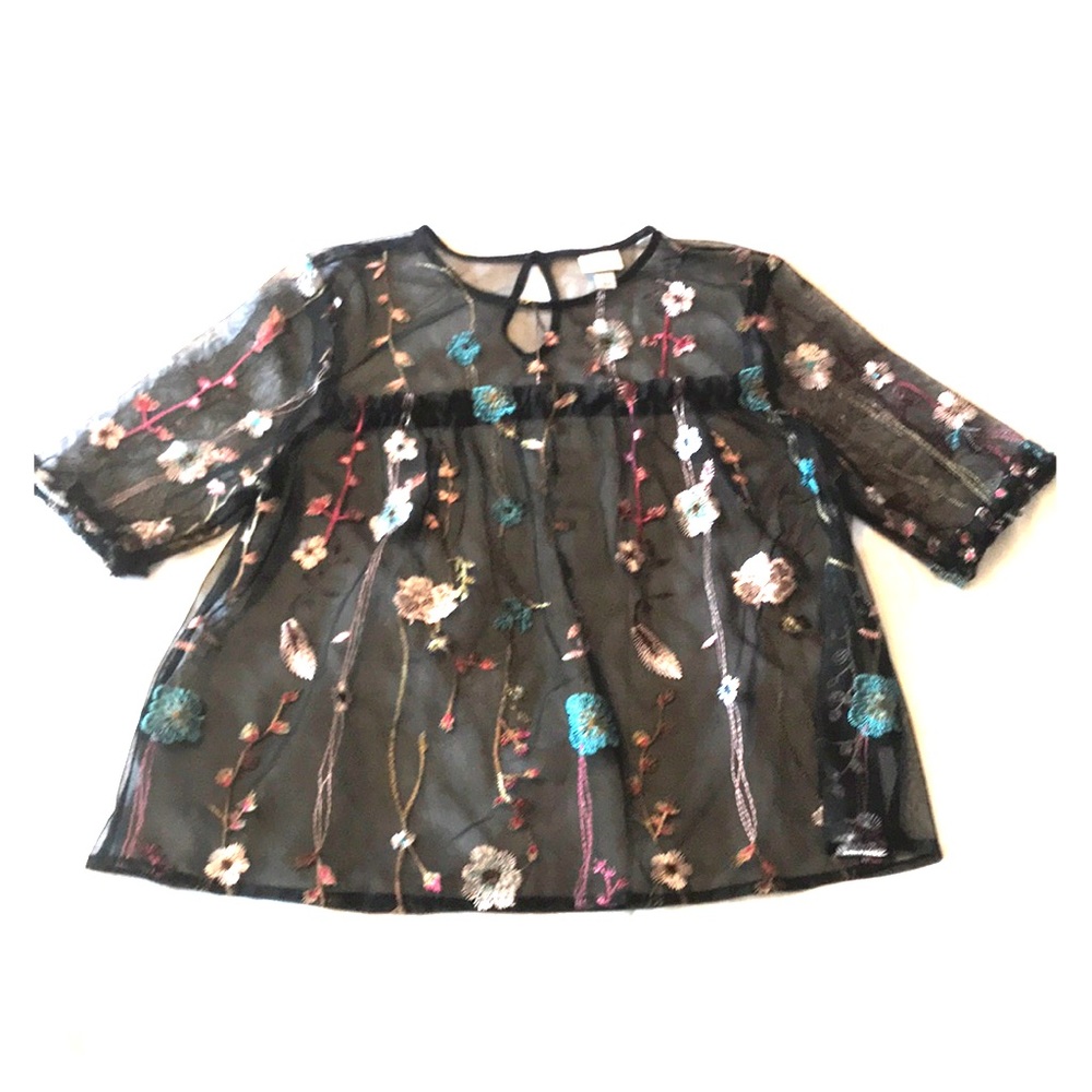 Sheer loose fitting top, key hole back
